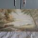 Old oil on rigid cardboard depicting swans on the water