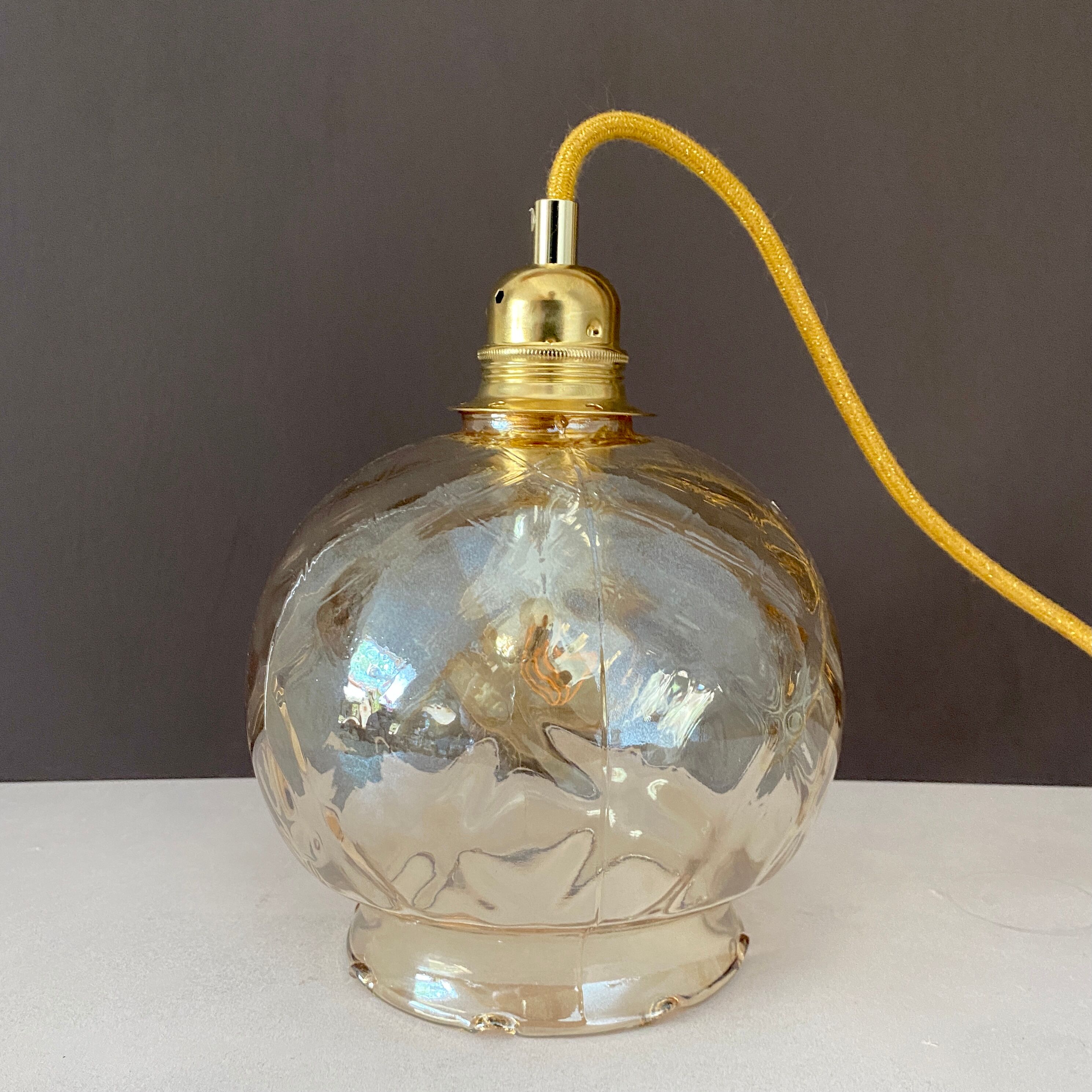Vintage amber glass globe player