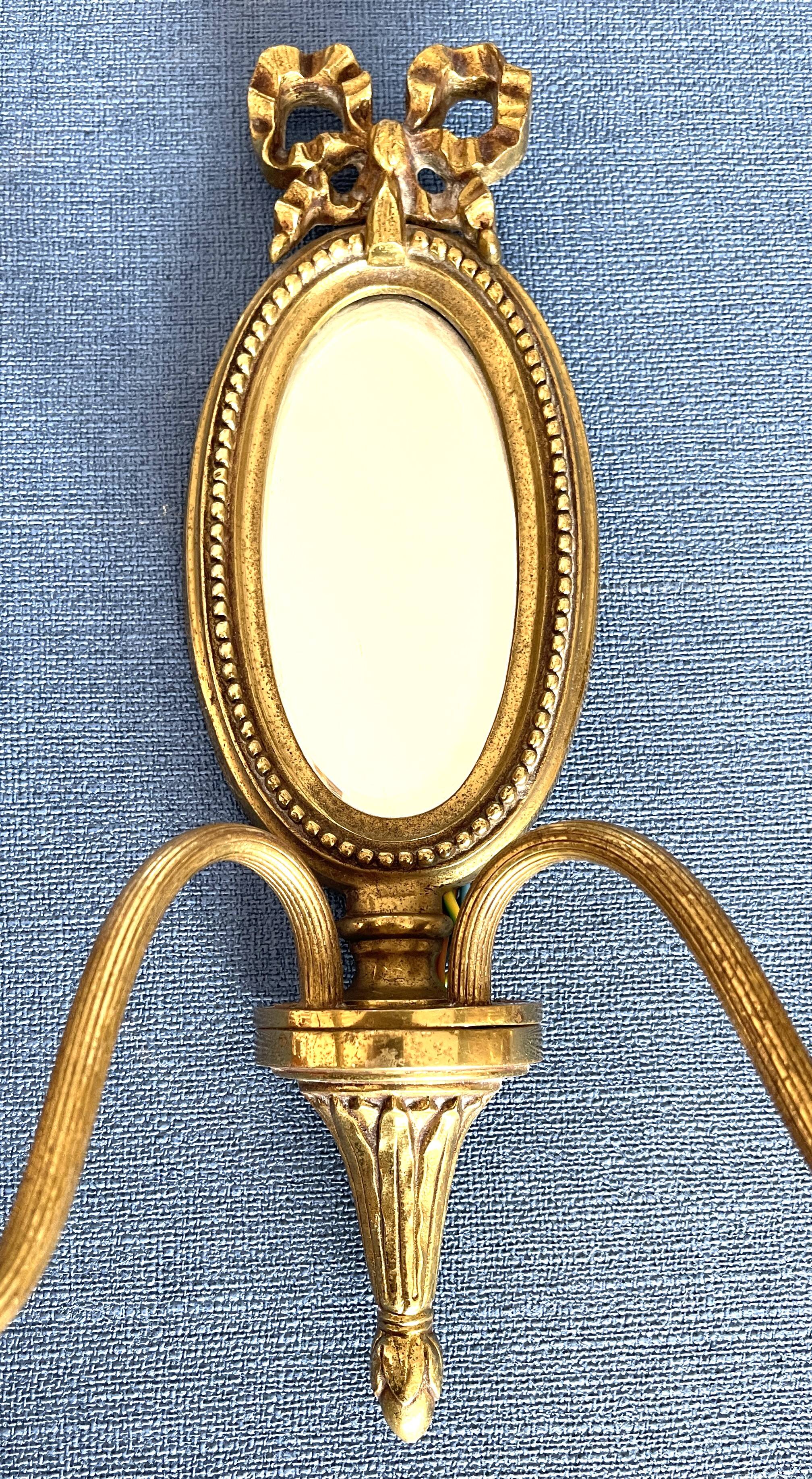 Pair of mirror wall lights in bronze - Maison Lucien Gau, Paris