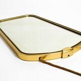 Beautiful small mid-century brass wall mirror with braided hanging strap