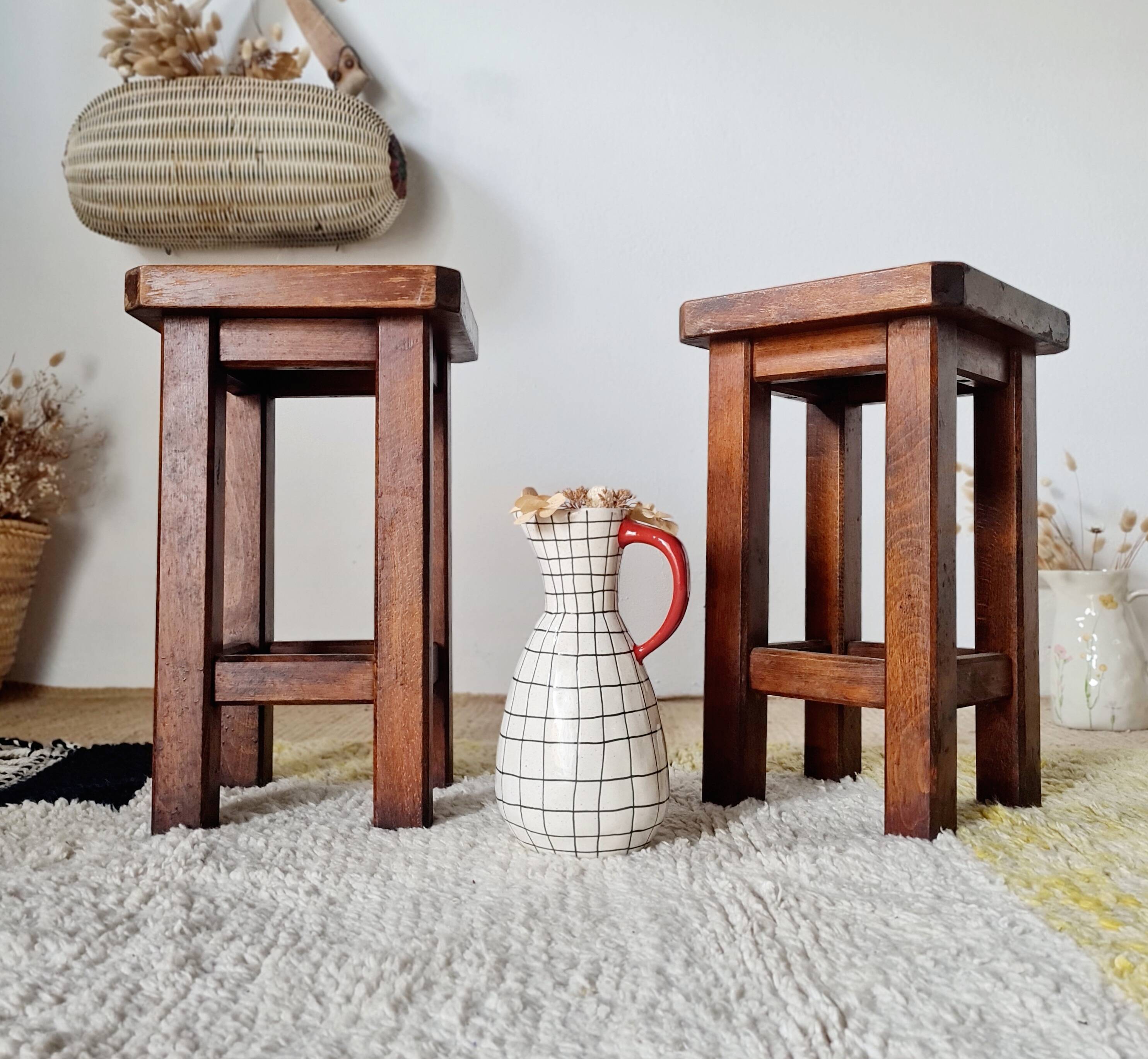 Pair of brutalist wooden stools, bedside tables.