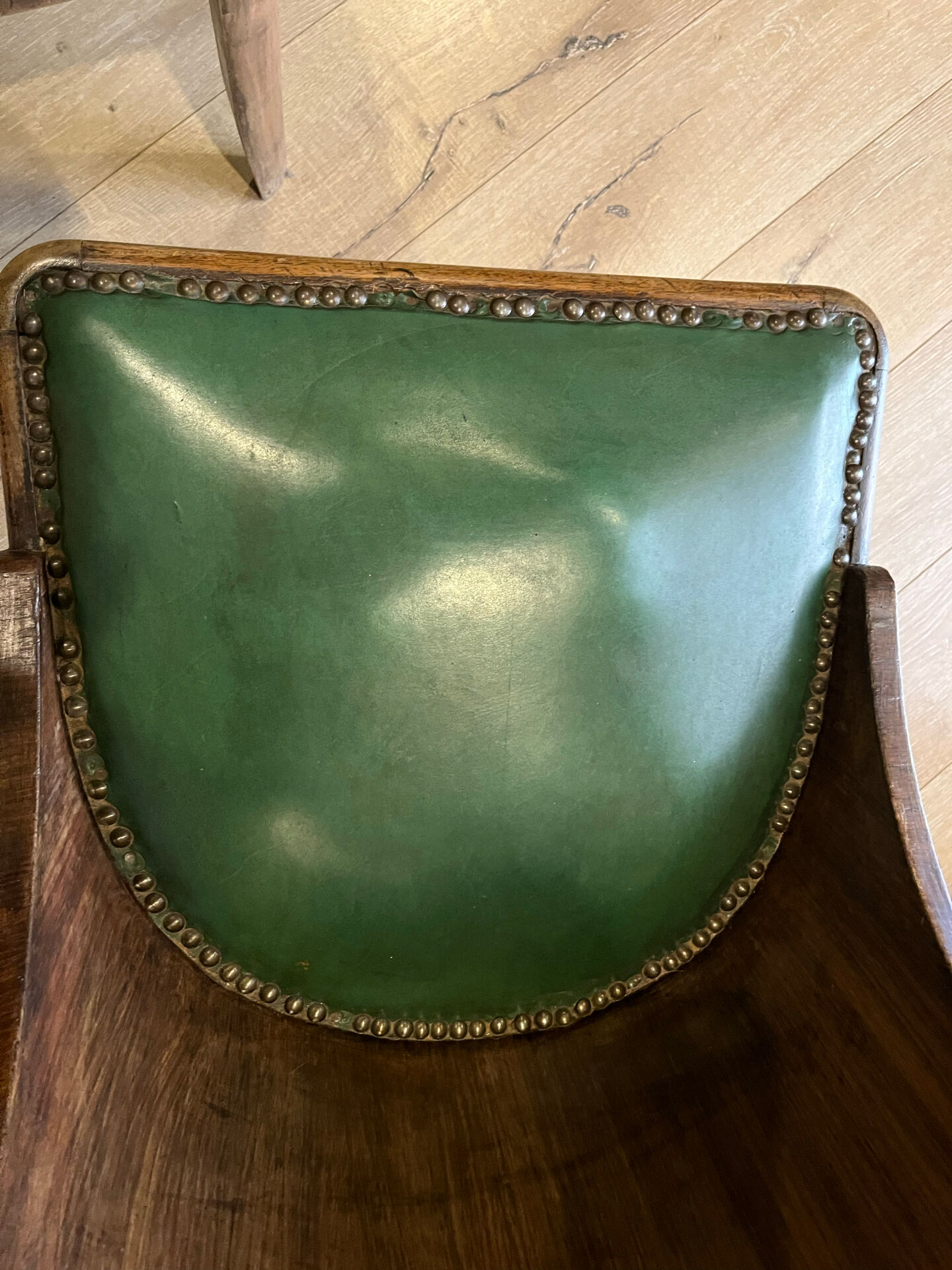 Pair of green leather gondola chairs Art Deco by De Coen