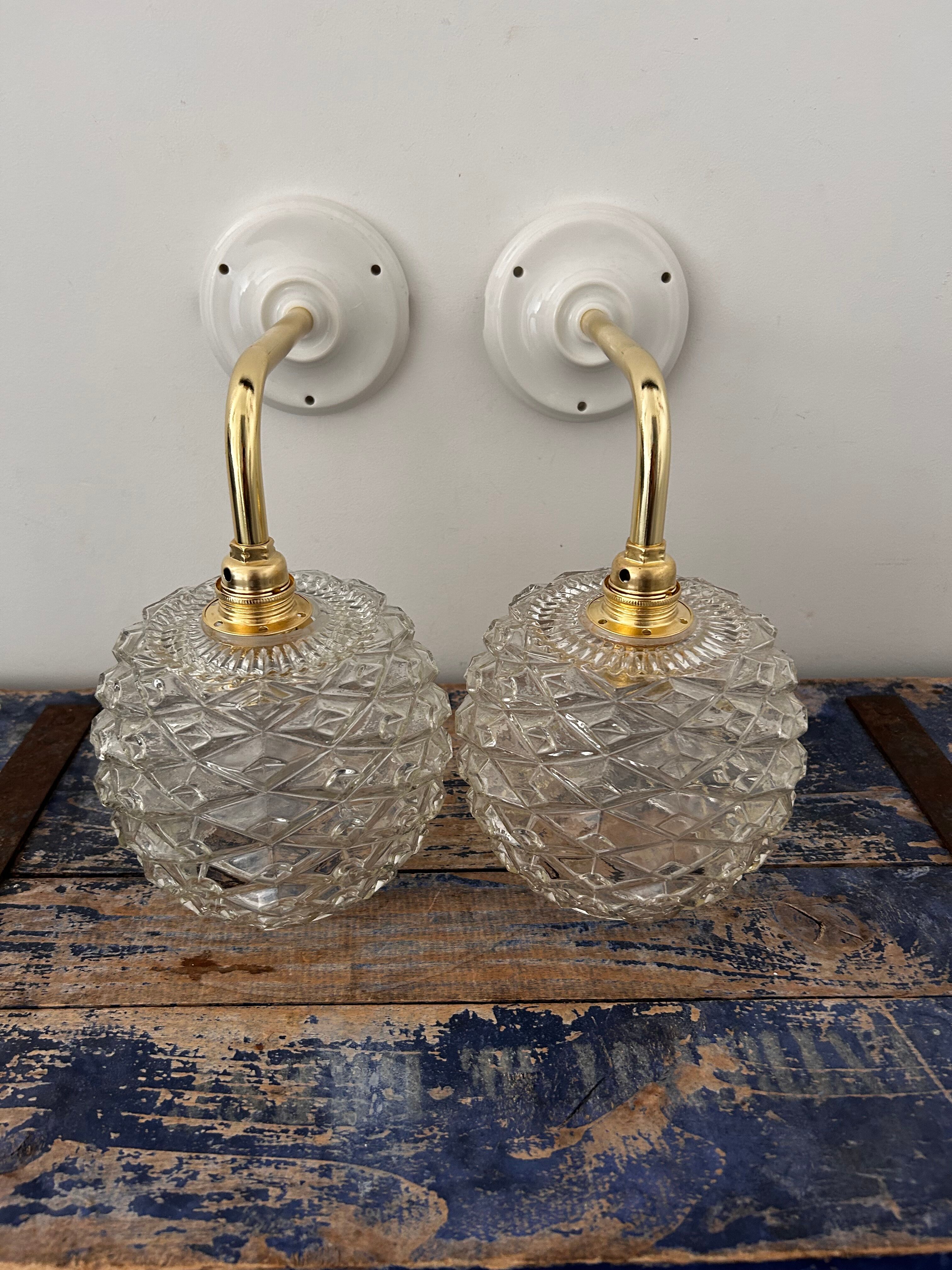 Set of chiseled glass wall sconces