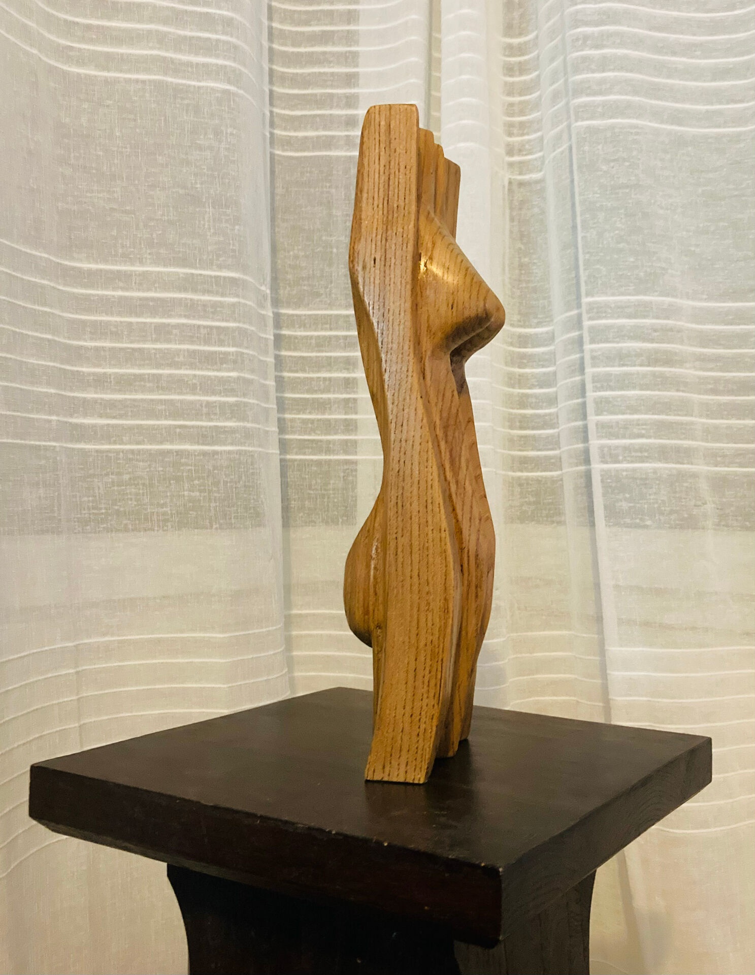 Stylised vintage female sculpture from the 1960s with organic shapes.
