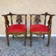 Pair of neo-Renaissance Henri II corner armchairs in carved wood, 19th century.