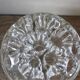 Large round glass flower frog vase with 19 holes.