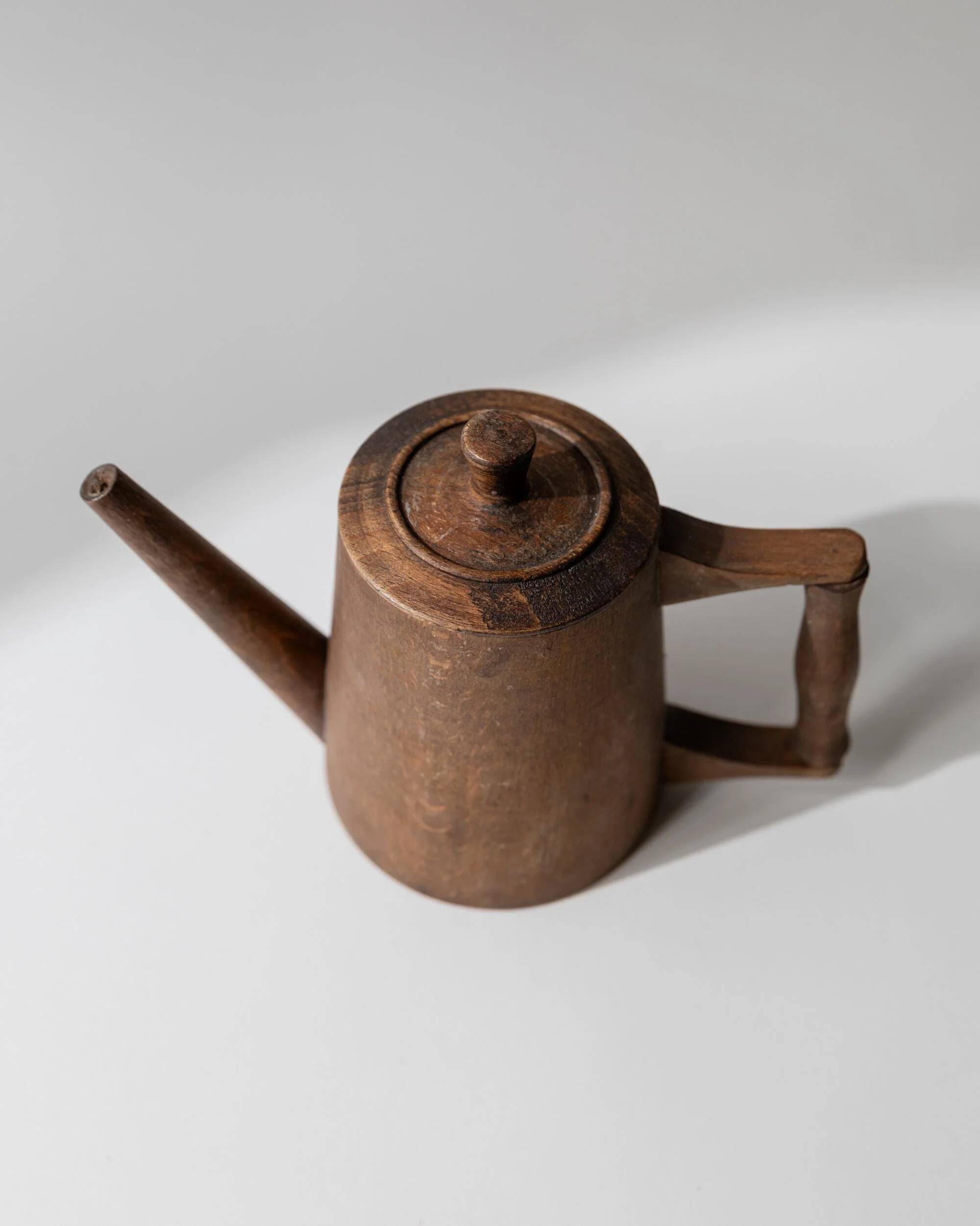 Vintage wooden pitcher from the 1960s, hand-carved.