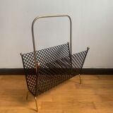 Perforated metal magazine door