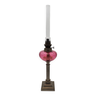 Old metal and pink glass oil lamp