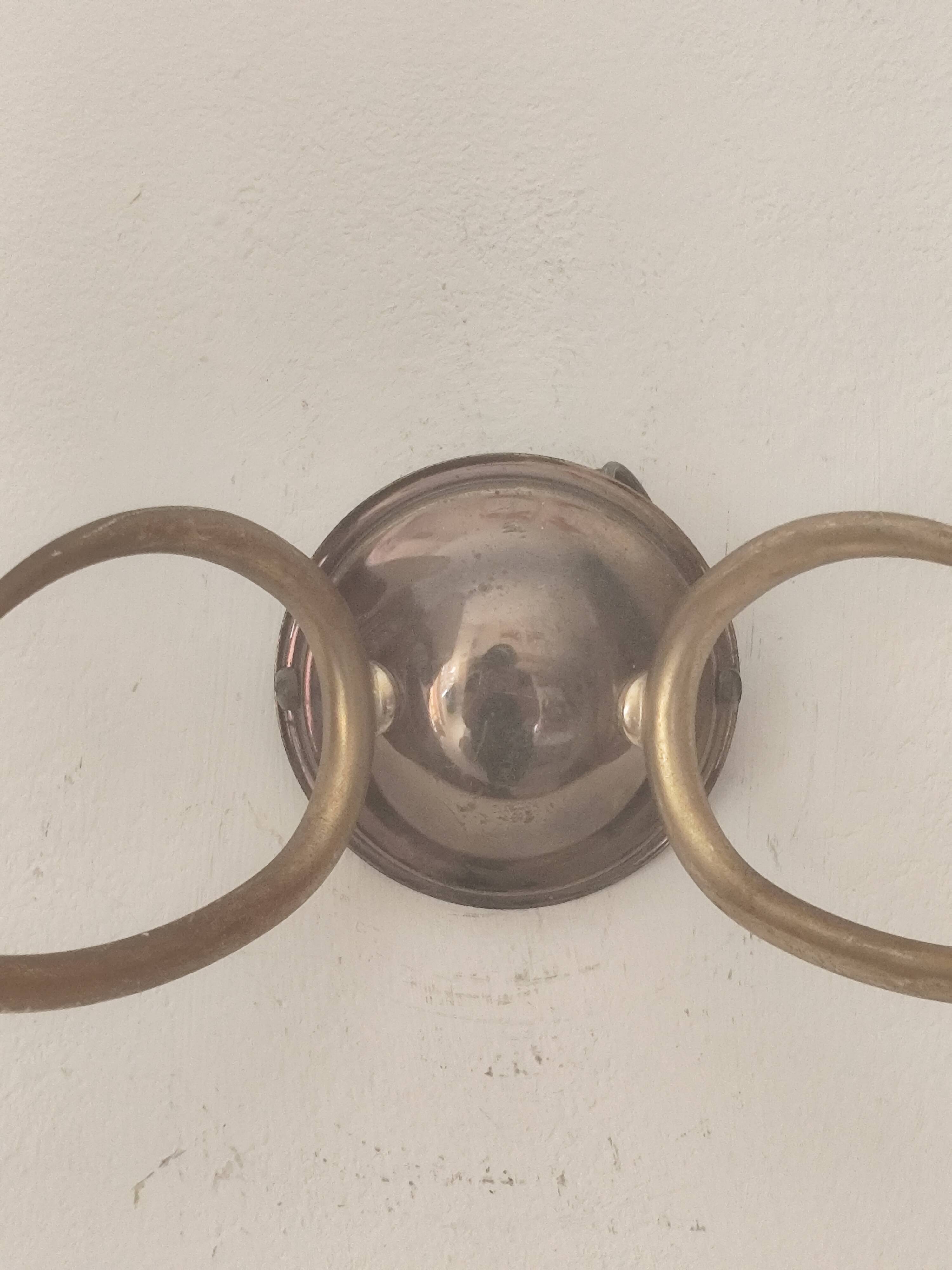 Two-light wall sconce in gilded metal with opaque glass shades, 1950/1960