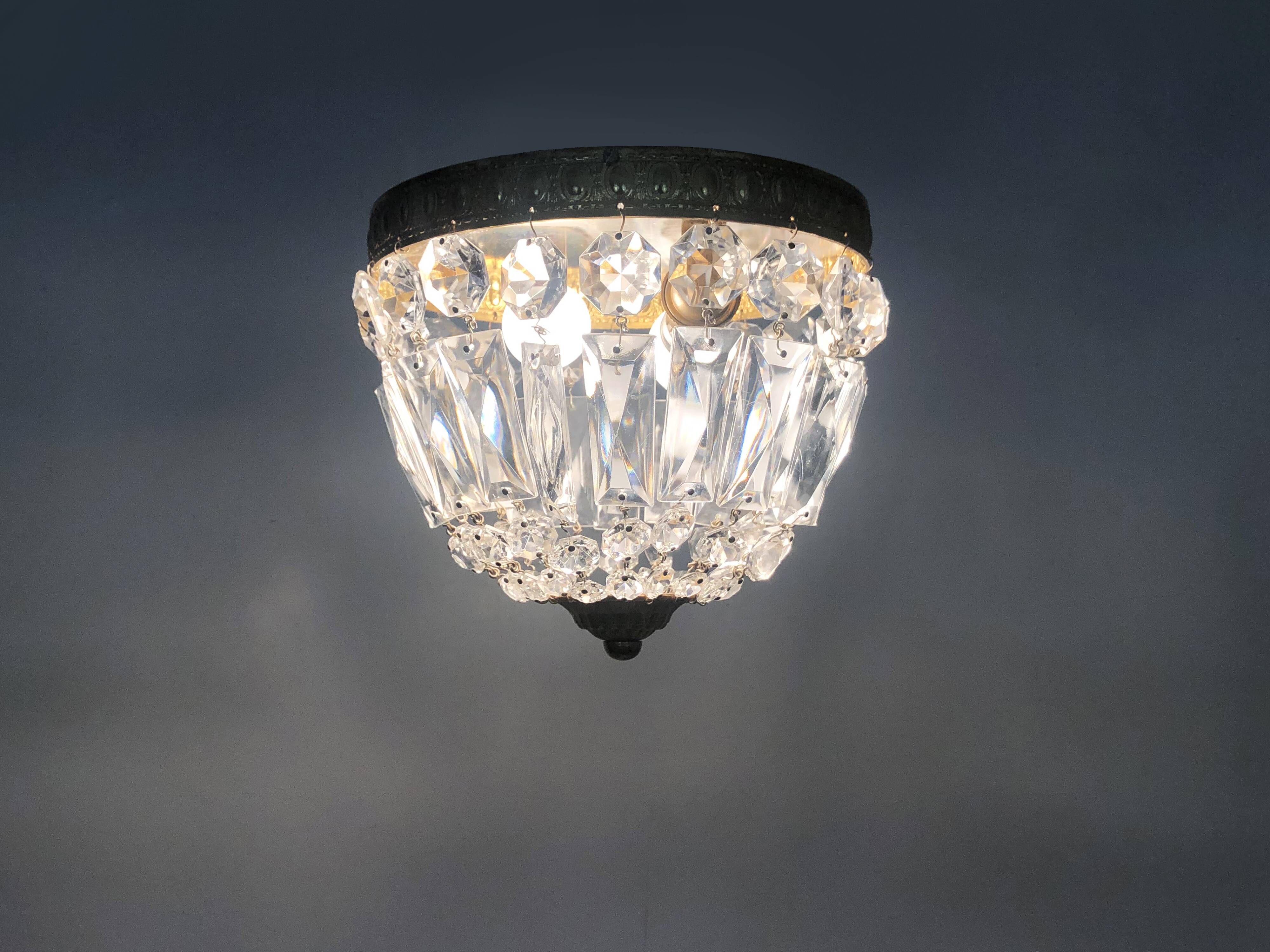 Old crown ceiling light with 2 bulbs, half basket with glass pendants.