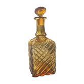 Antique decanter made of amber blown glass