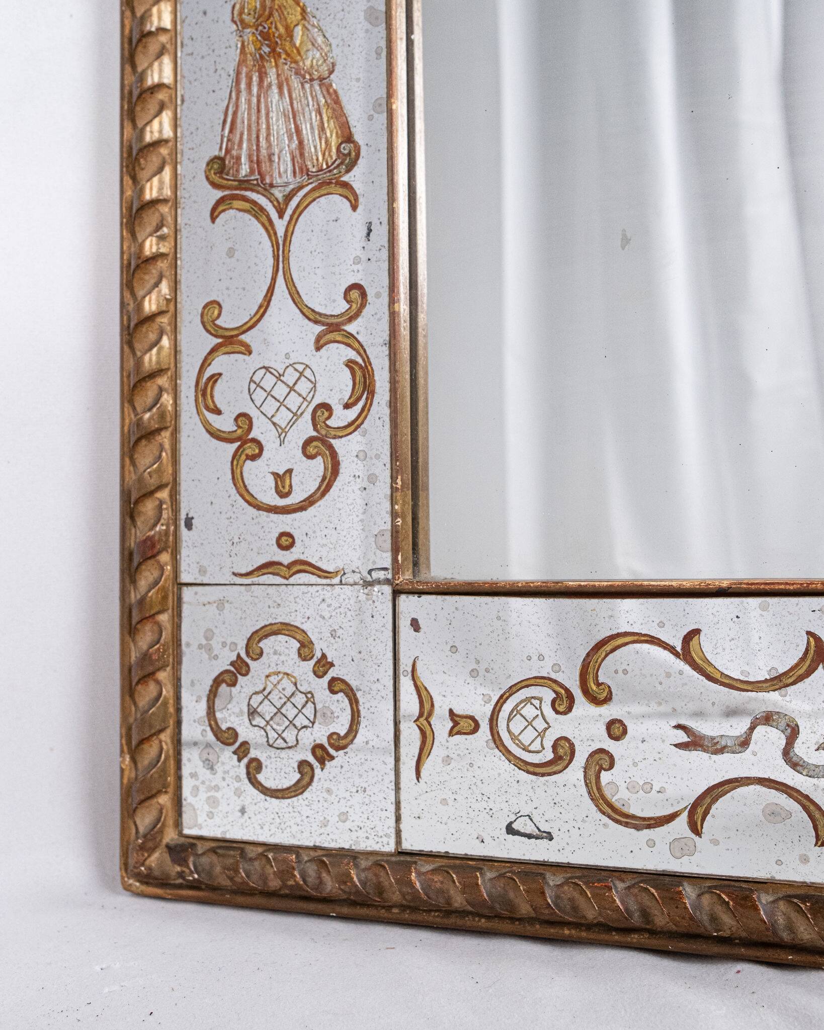 Miroir italien en verre églomisé, à parecloses, début XXe siècle