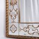 Miroir italien en verre églomisé, à parecloses, début XXe siècle