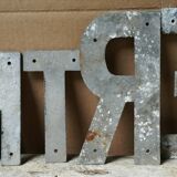 Entry into letters metal vintage