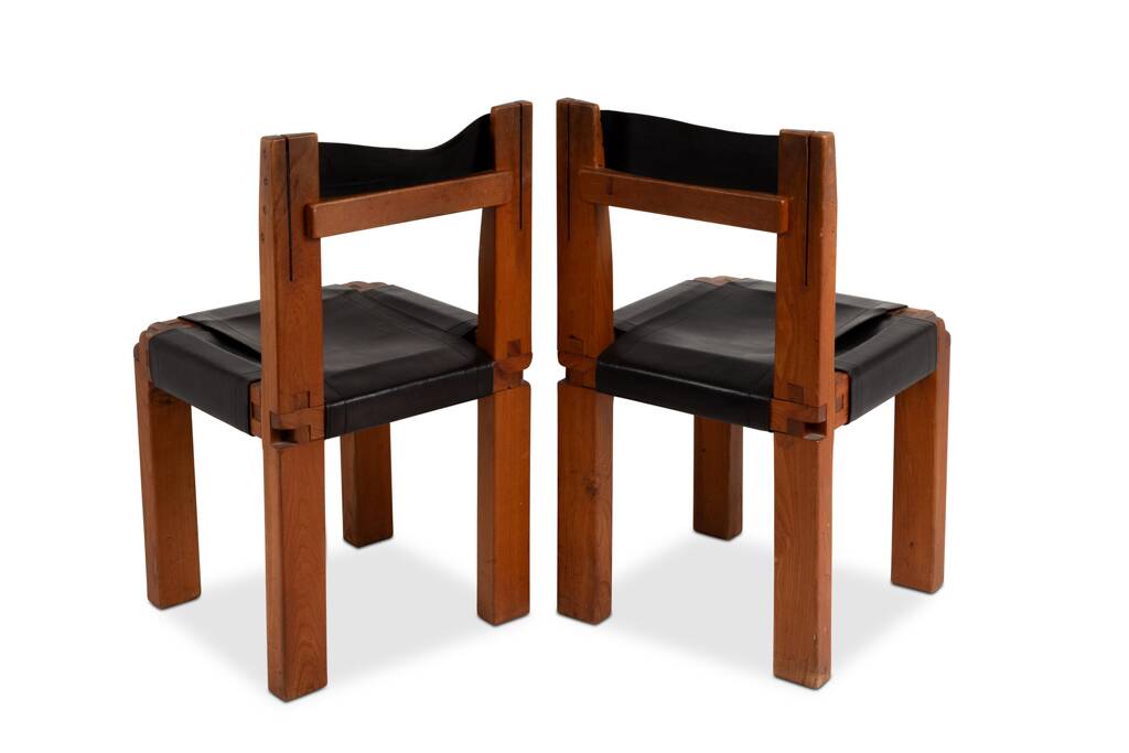 Pierre Chapo. Series of 8 "S11" chairs in elm and leather. 1960s-70s.
