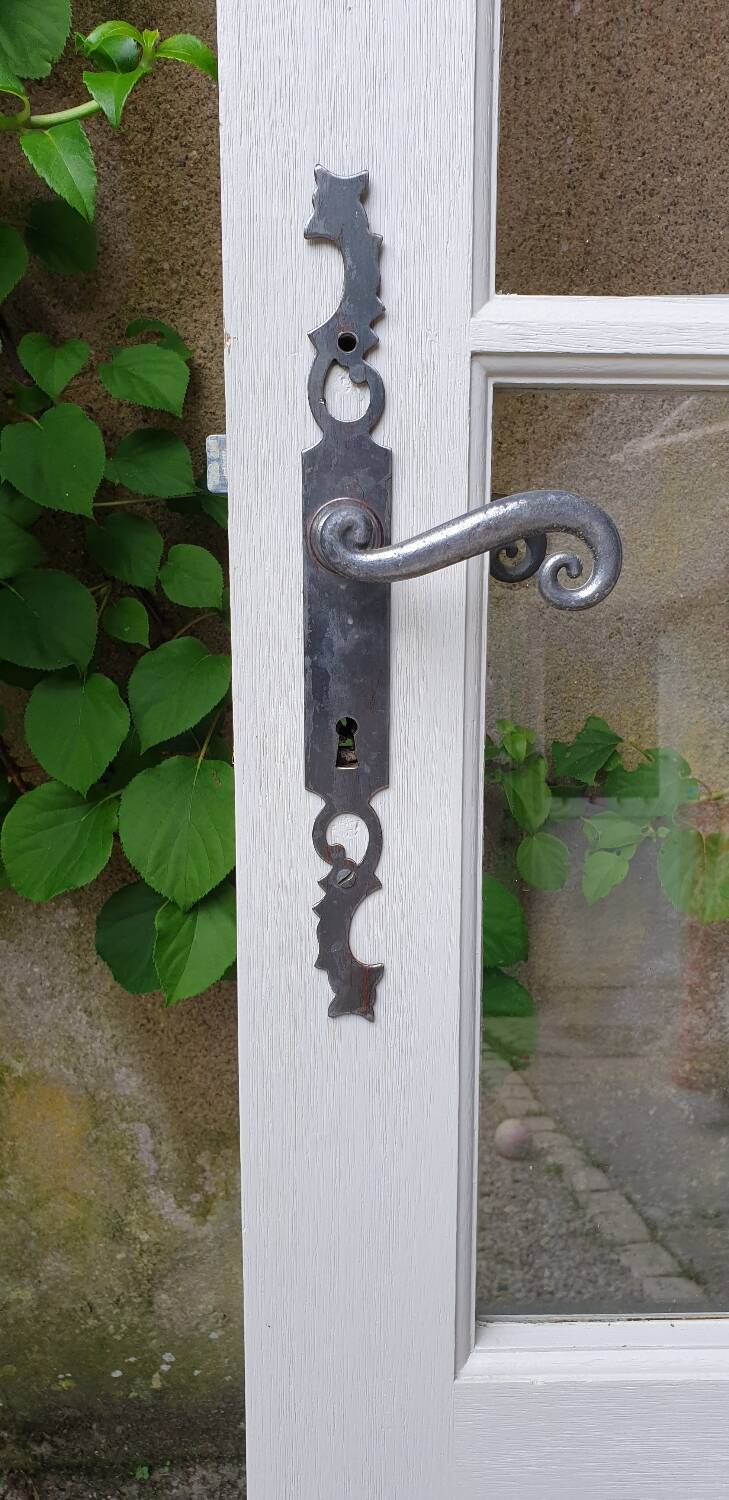Old wooden door with small squares