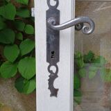 Old wooden door with small squares