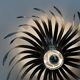 Silver wrought iron sunburst wall light from the 1960s.