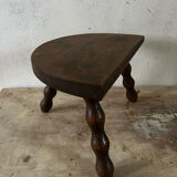 Wooden tripod farm stool