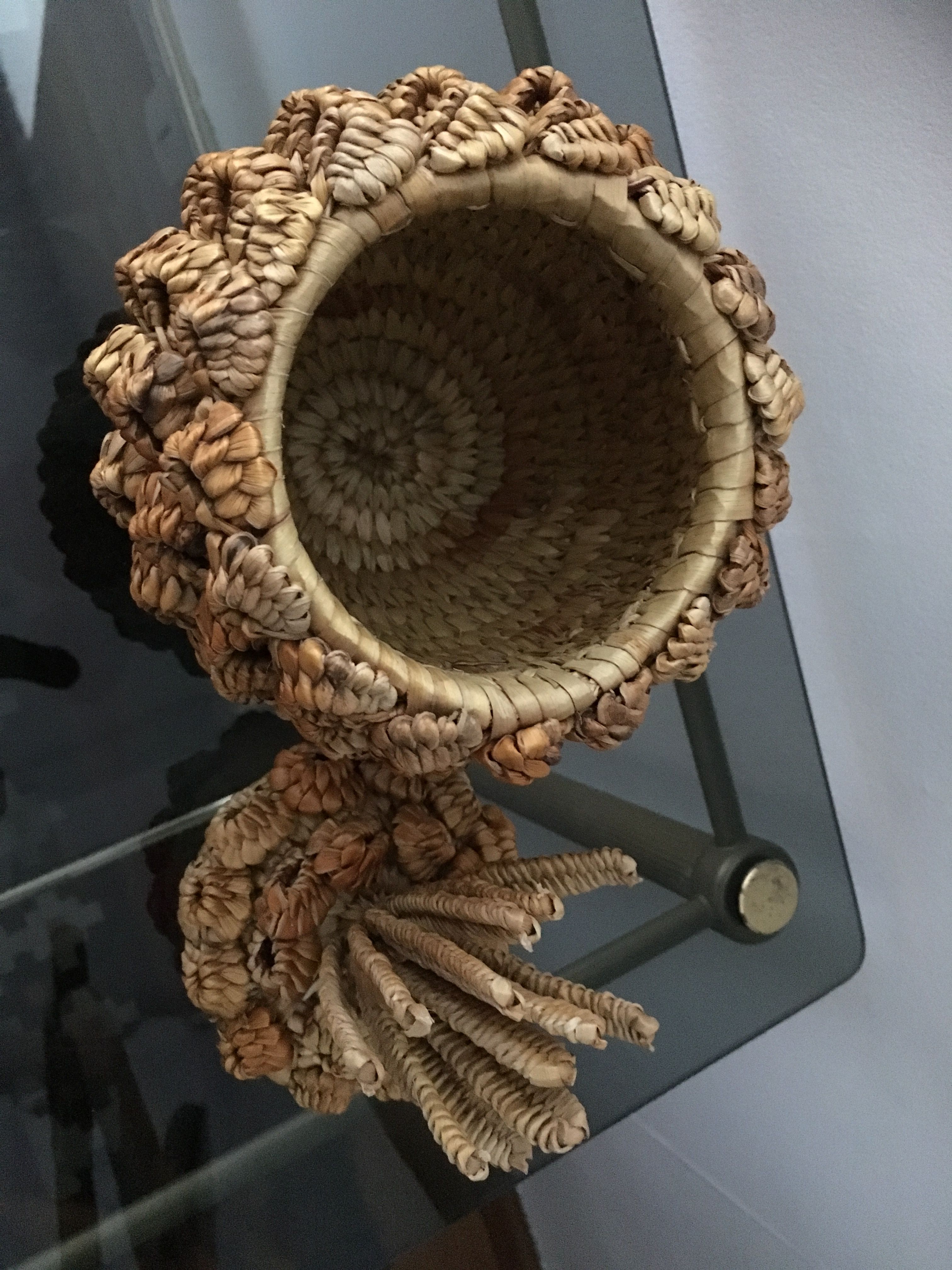 Trash in the form of the pineapple in natural fibers