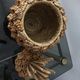 Trash in the form of the pineapple in natural fibers