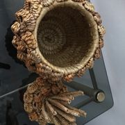 Trash in the form of the pineapple in natural fibers