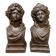 Paire de chenets anciens en fonte à bustes antiques