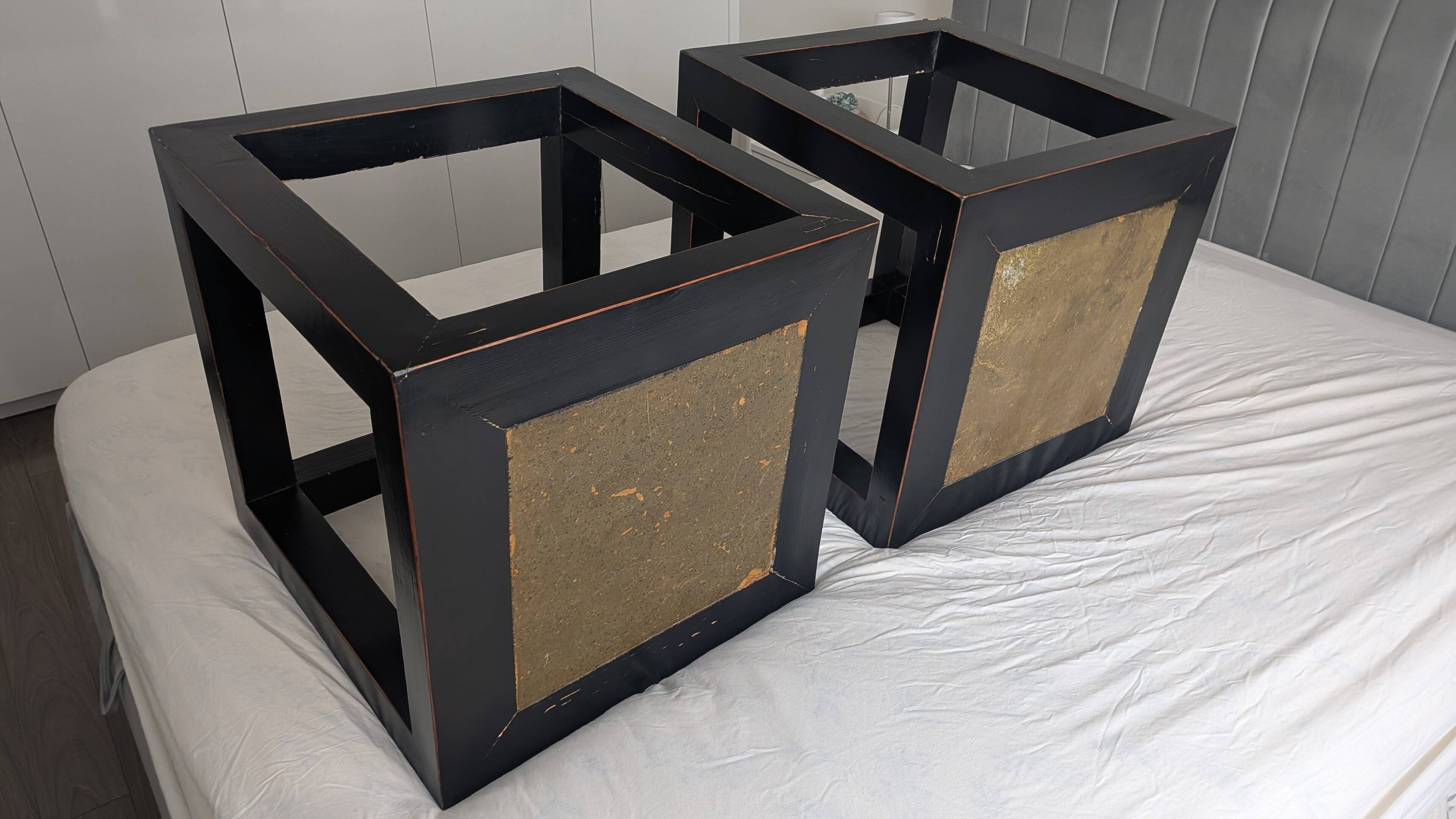 Chinese side tables in black lacquer, stone top.