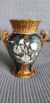 Vintage slip vase with floral decoration