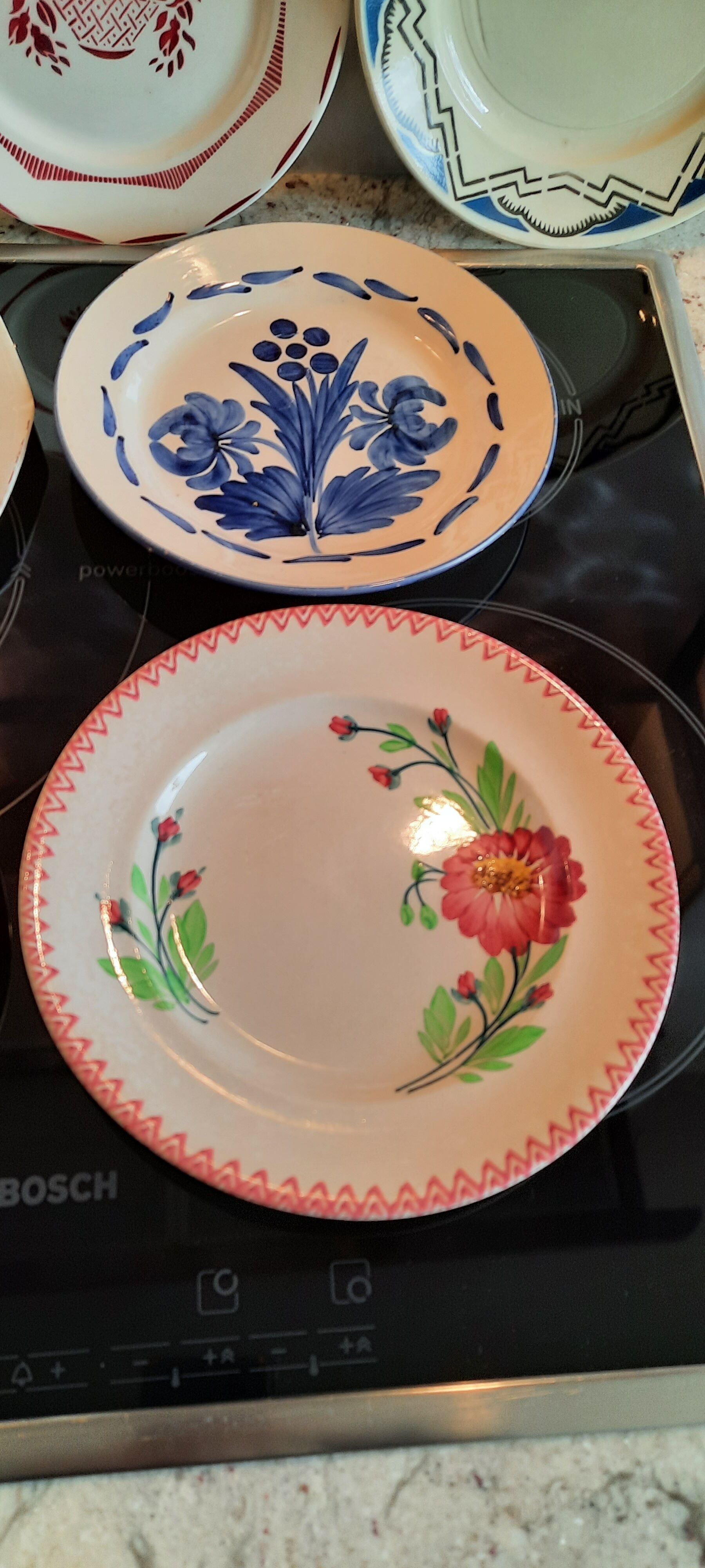 Old flat faience plates