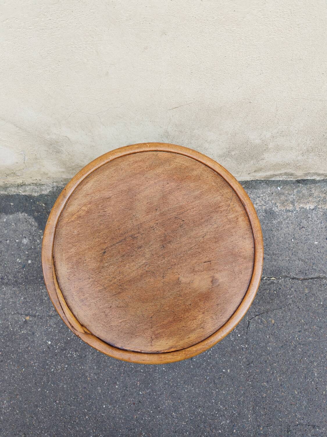 Curved wooden stool