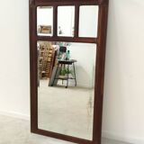 Antique beveled mirror on a wooden frame, 1930