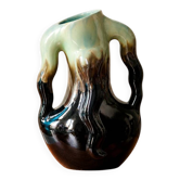 Rare ancient organic vase from Thulin in glazed flame pottery.