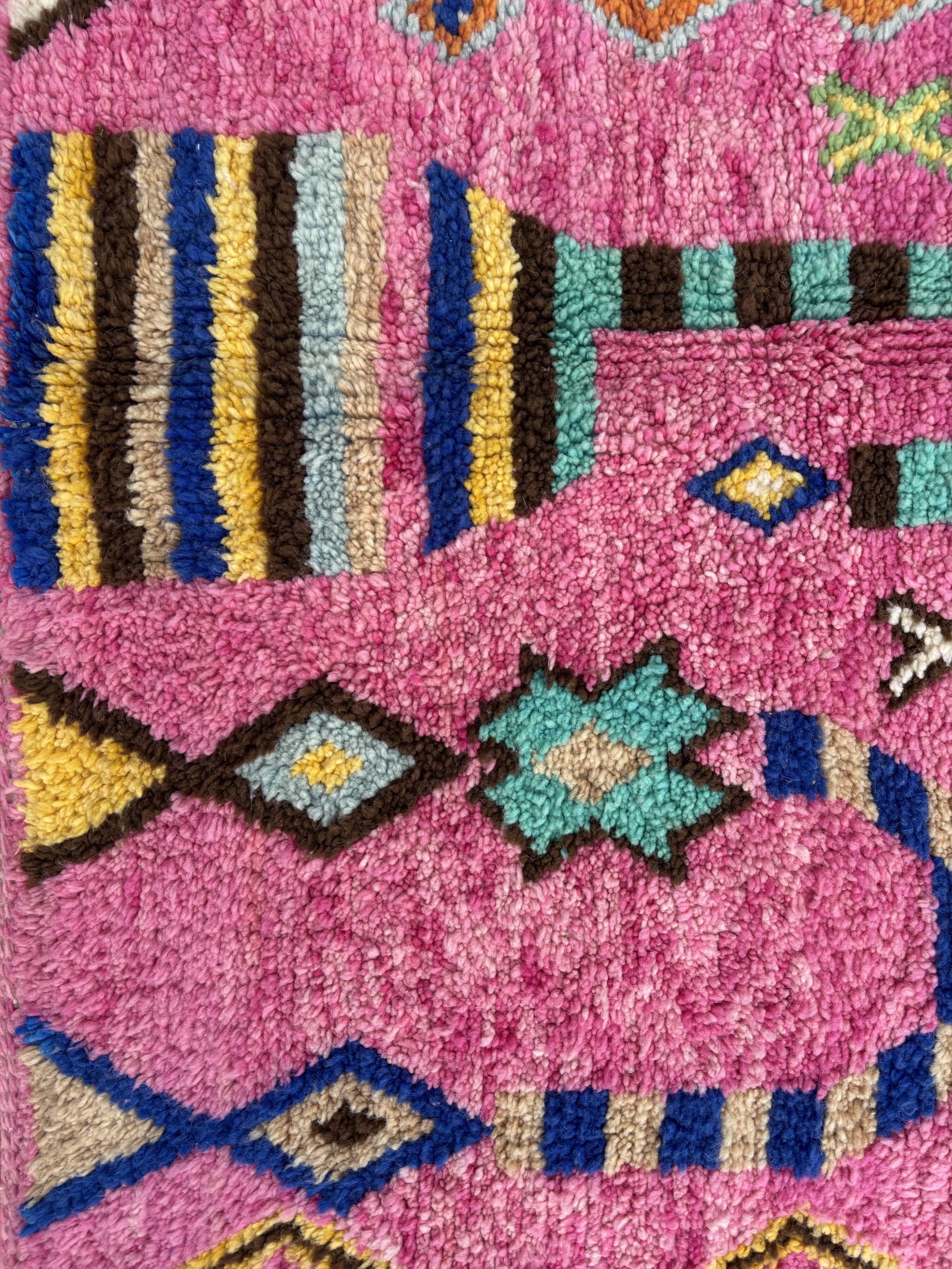 Boho chic Moroccan pink wool rug