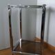 Chrome metal and smoked glass console