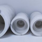 Four white marble candlesticks with black veins, 70s design