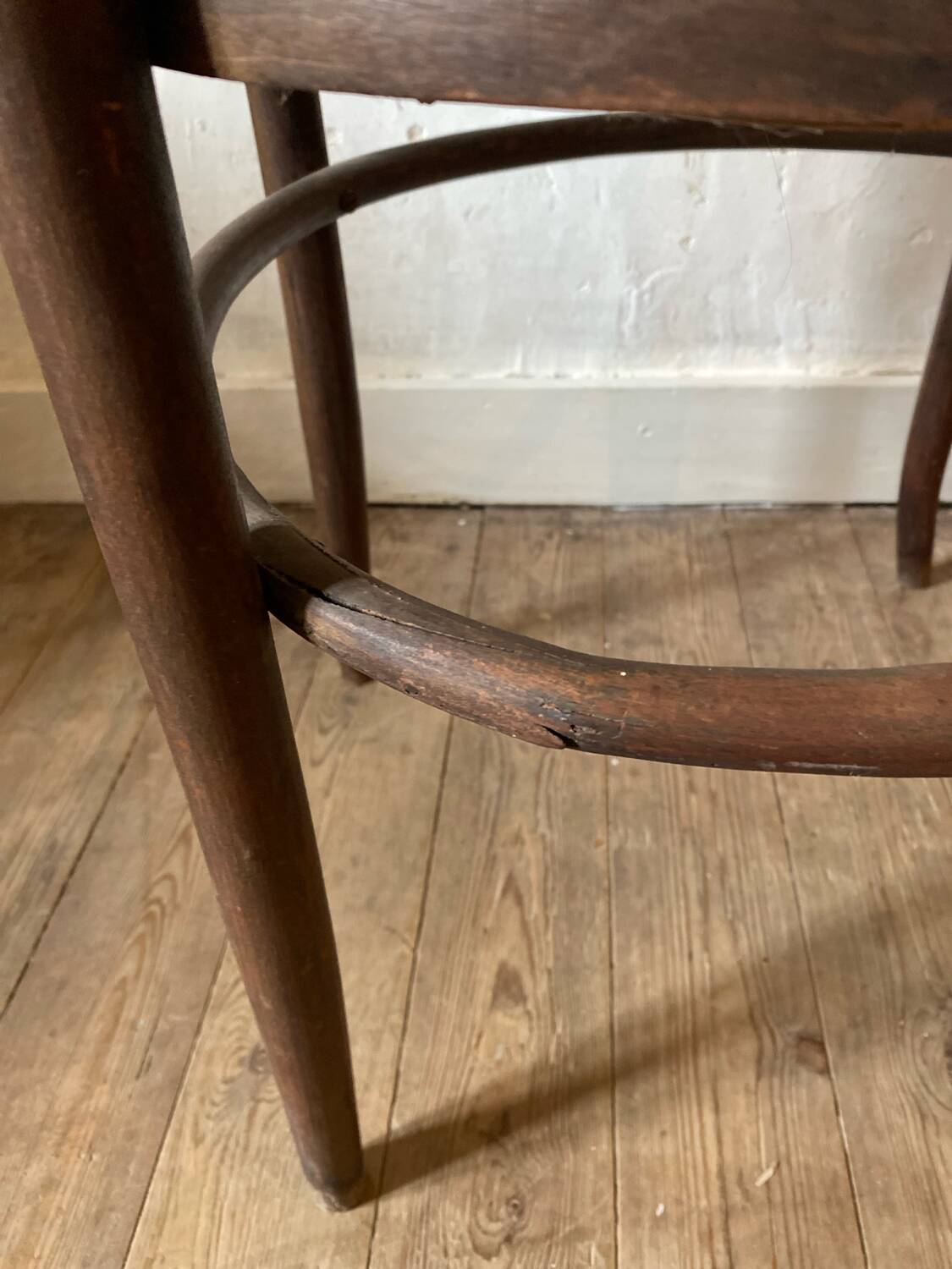 Cane and curved wood armchair