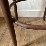 Cane and curved wood armchair