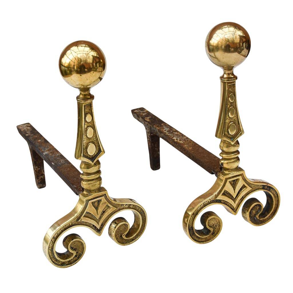 Gilded bronze andirons with rounded ball and patterns, antique fireplace accessory