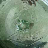 Give me a green glass Jeanne VOD with its stopper, 6l.