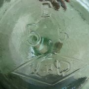 Give me a green glass Jeanne VOD with its stopper, 6l.