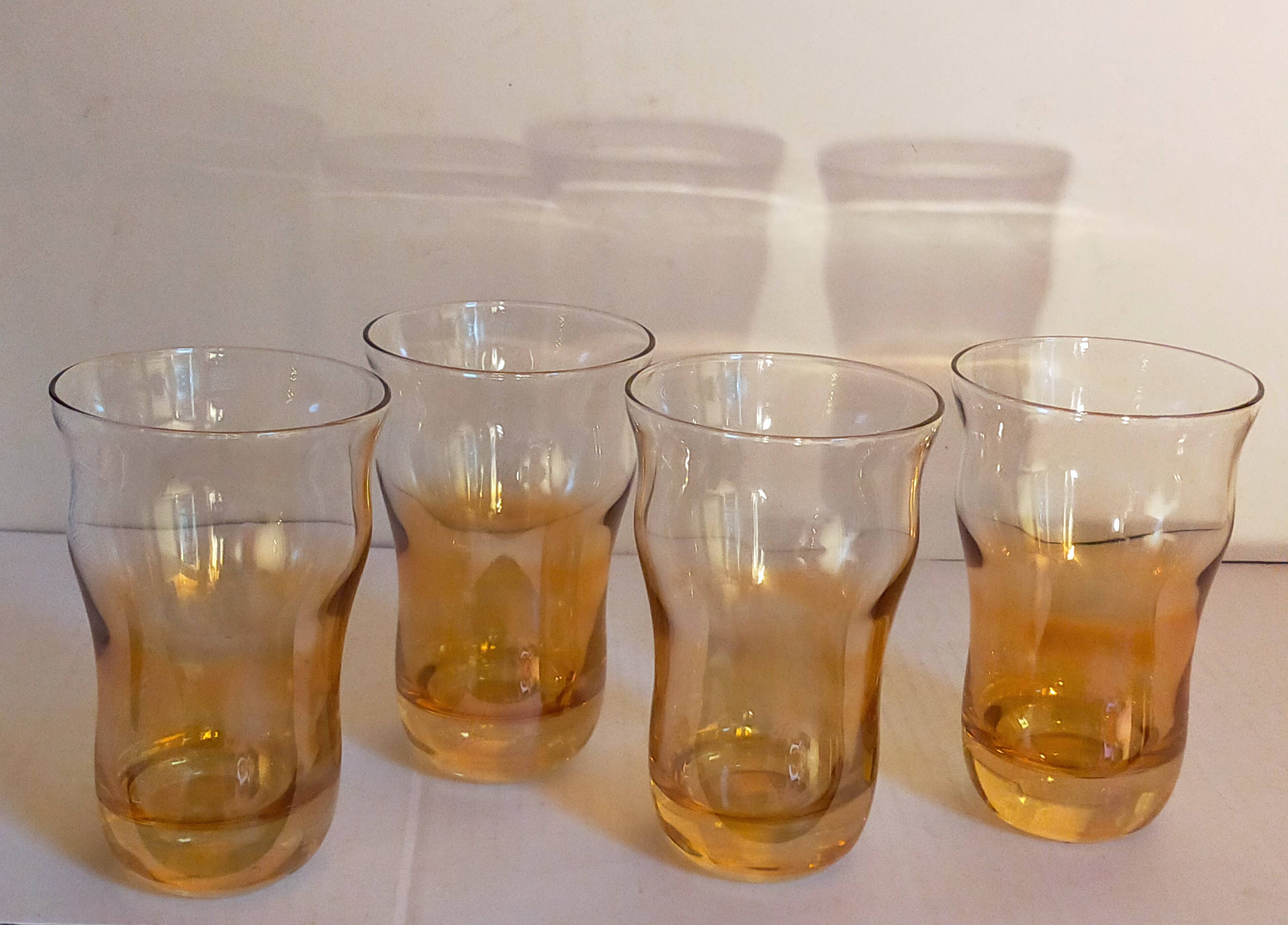 Four iridescent honey blown glass glasses