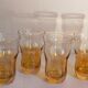 Four iridescent honey blown glass glasses