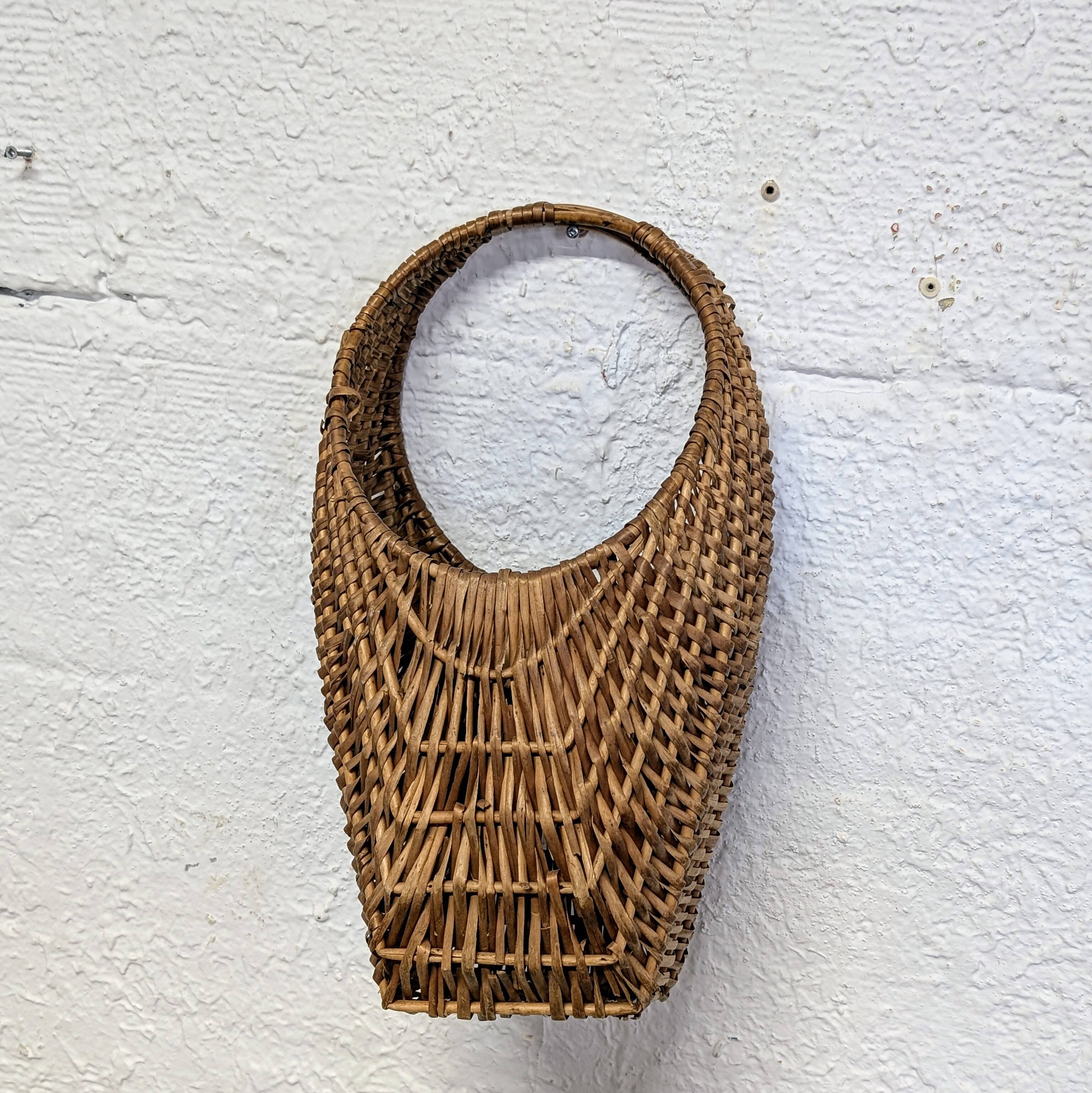 Large-handled woven wicker basket