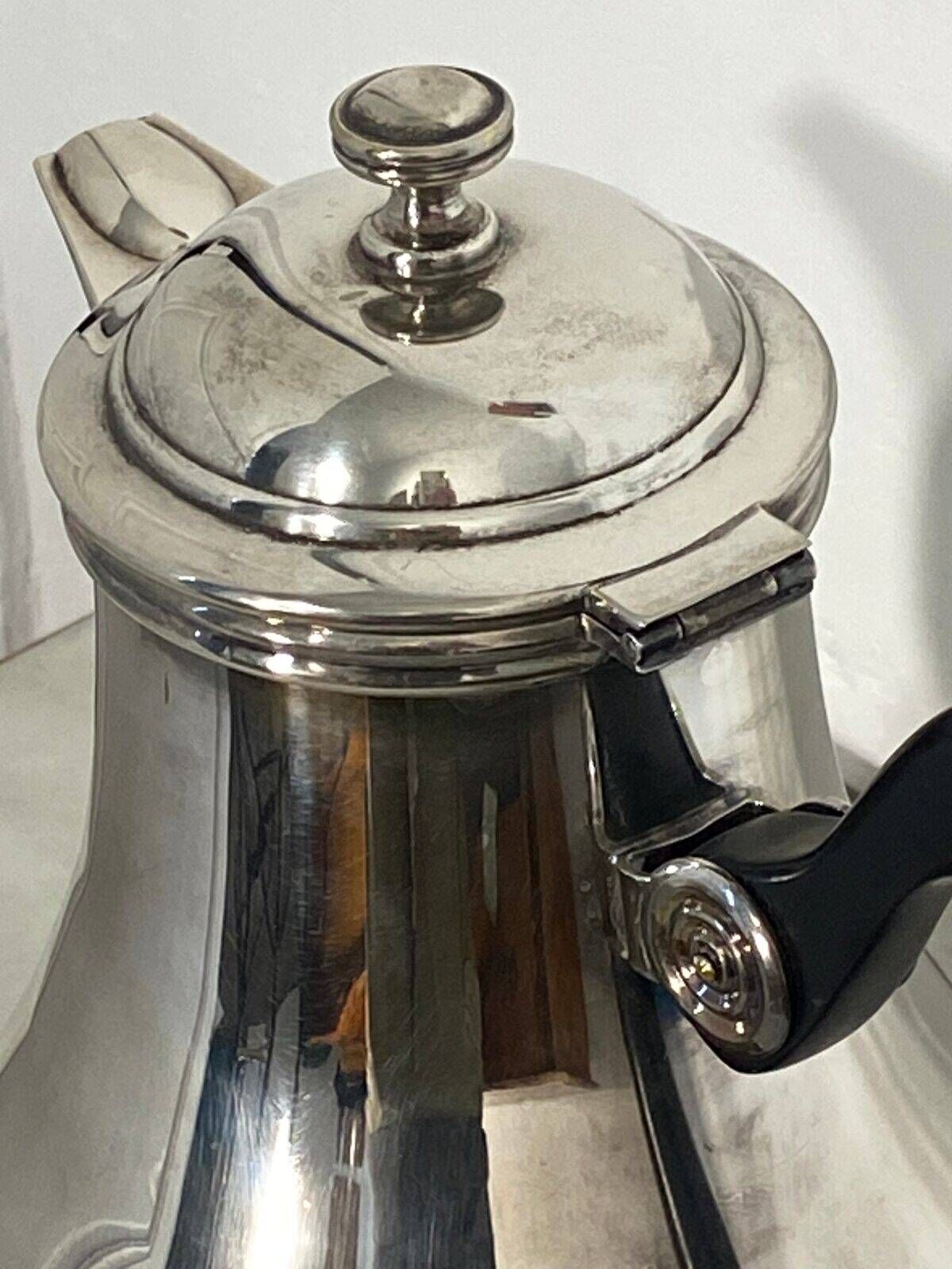 Saint Hilaire teapot in silver-plated metal, with a blackened handle.