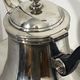 Saint Hilaire teapot in silver-plated metal, with a blackened handle.
