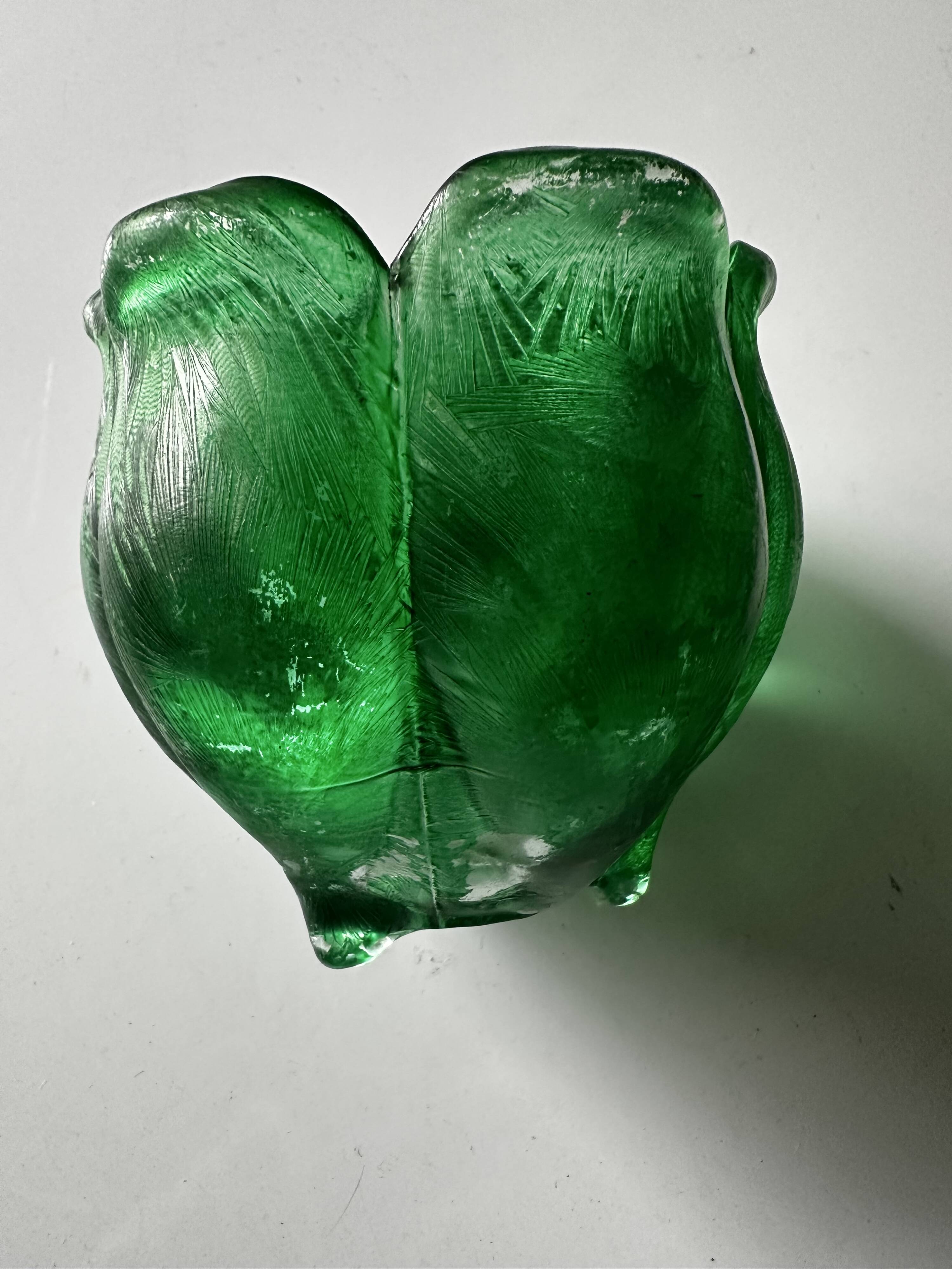 Green glass paste emptying cup from the Art Deco period
