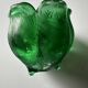 Green glass paste emptying cup from the Art Deco period