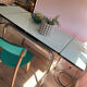 Green water Formica table with its 2 extensions.